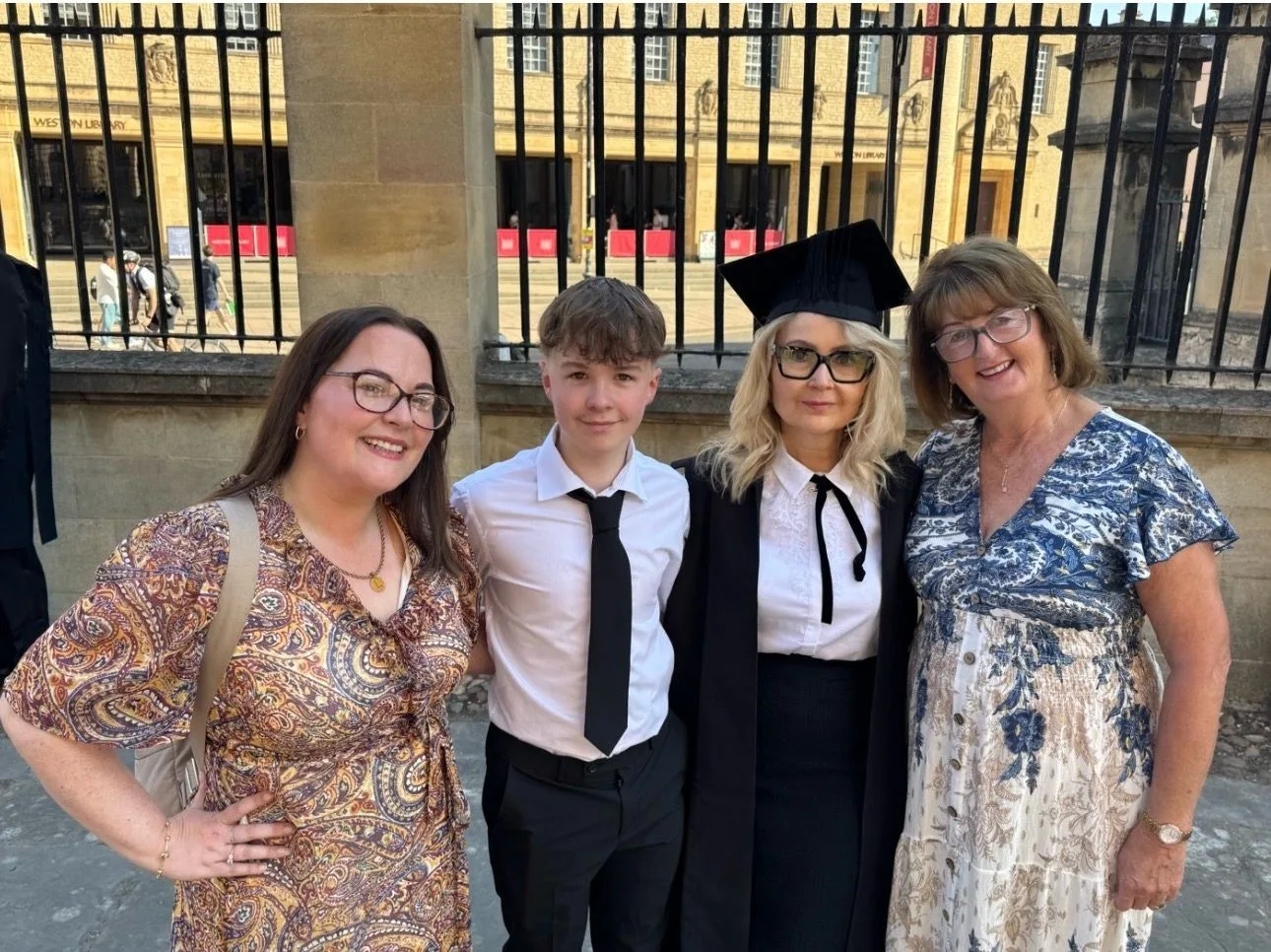 Dr Olga Mikulich with family and friends at her Oxford graduation celebration